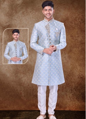 Regal Sky Bllue and Off White Sherwani with Jaqard Top and Dhupion Silk Bottom.