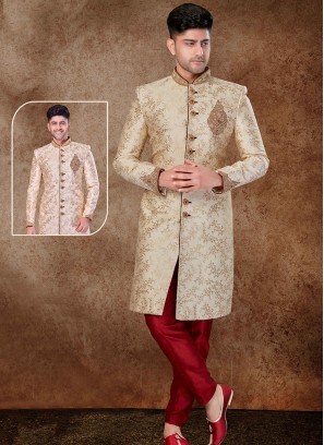 Regal Gold and Maroon Sherwani with Jaqard Top and Dhupion Silk Bottom.