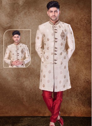 Regal Light Gold and Maroon Sherwani with Jaqard Top and Dhupion Silk Bottom.