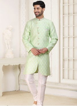 Pista Green Banarasi Jacquard Indo Western Ensemble with Off White Aligadhi Pant.