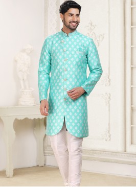 Green Banarasi Jacquard Indo Western Ensemble with Off White Aligadhi Pant.