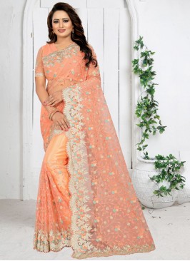 Snazzy Peach Embroidered Traditional Saree