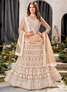 Snazzy Peach Embroidered Trendy Lehenga Choli