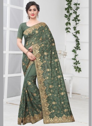 Snazzy Zari Green Silk Traditional Saree