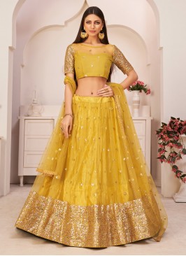 Specialised Net Embroidered Yellow Lehenga Choli