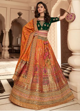 Strange Weaving Green and Orange Banarasi Silk Designer Lehenga Choli