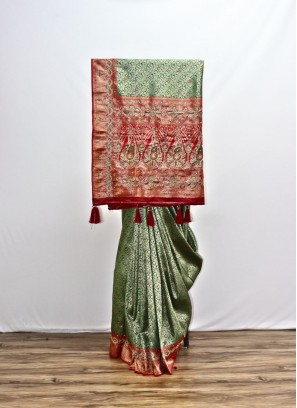 Stunning Green And Red Kanjivaram Silk Saree For Social Function