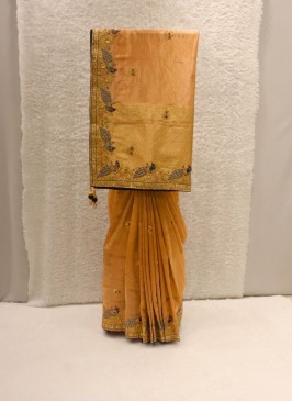 Stylish Orange Banarasi Tissue Silk Saree For Social Function