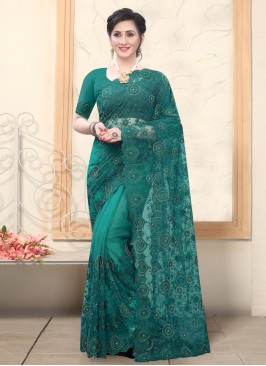 Superb Embroidered Teal Net Classic Designer Saree