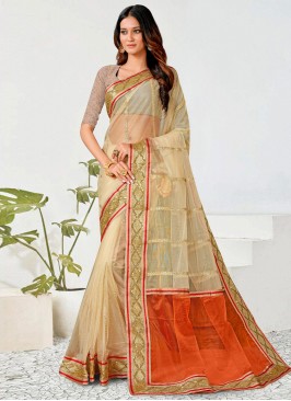 Superlative Beige and Orange Embroidered Net Classic Saree