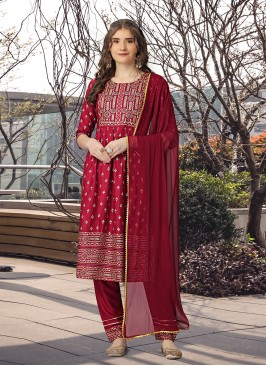 Surpassing Beige and Red Print Rayon Salwar Suit