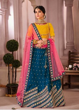 Teal Blue And Yellow Color Wedding Lehenga