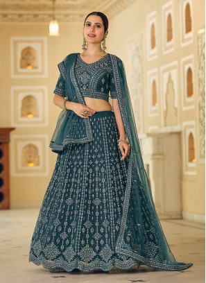 Teal Color Mirror Embroidered Lehenega In Net