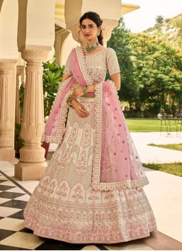 Tempting Cream Sequins Lehenga Choli