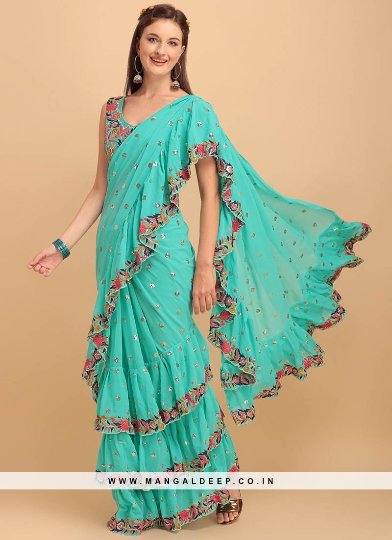 https://www.mangaldeep.co.in/image/cache/data/turquoise-color-georgette-embroidered-ruffle-saree-46715-800x1100.jpg