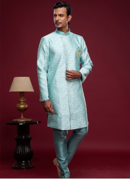 Turquoise Elegance: Banarasi Jacquard Semi-Indo Fusion Ensemble.