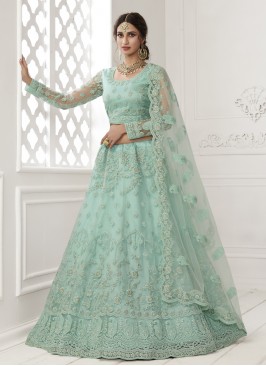 Urbane Net Turquoise Embroidered Lehenga Choli