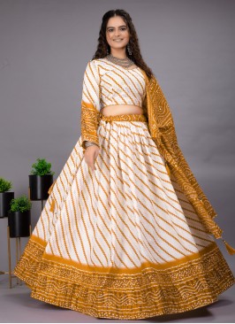 Versatile Foil Print Mustard A Line Lehenga Choli