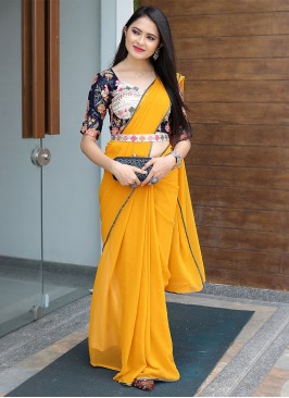 Voluptuous Embroidered Mustard Georgette Traditional Saree