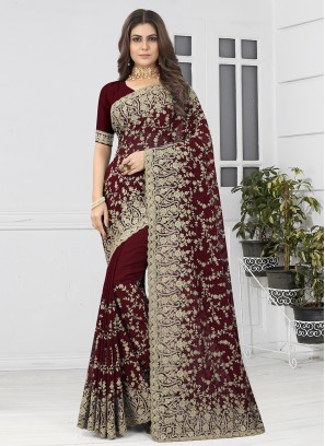 Voluptuous Maroon Georgette Classic Designer Saree