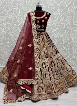 Voluptuous Velvet Embroidered Maroon Trendy Long Choli Lehenga