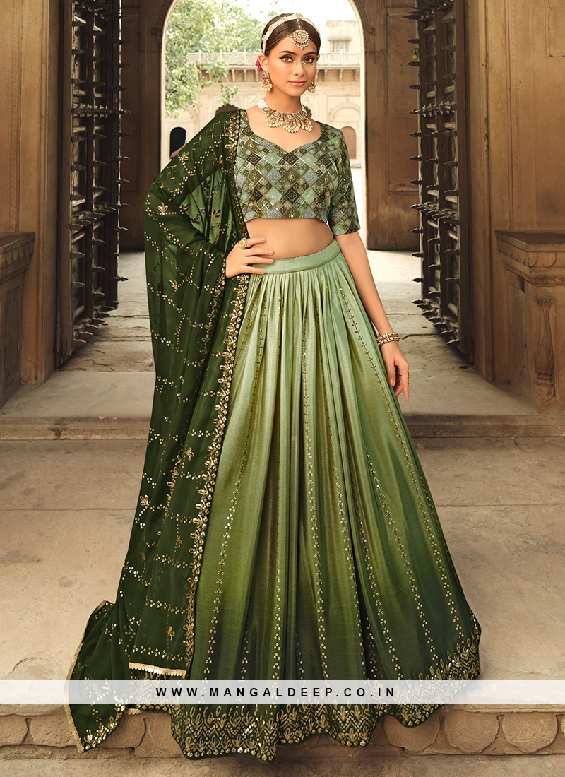 https://www.mangaldeep.co.in/image/cache/data/wedding-function-war-green-color-silk-embroidered-lehenga-choli-48315-800x1100.jpg