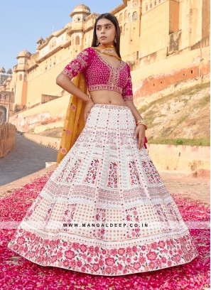 White Georgette Lehenga with Embroidery and Sequins work and Silk Blouse