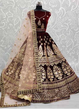 Wonderous Maroon Embroidered Velvet Lehenga Choli